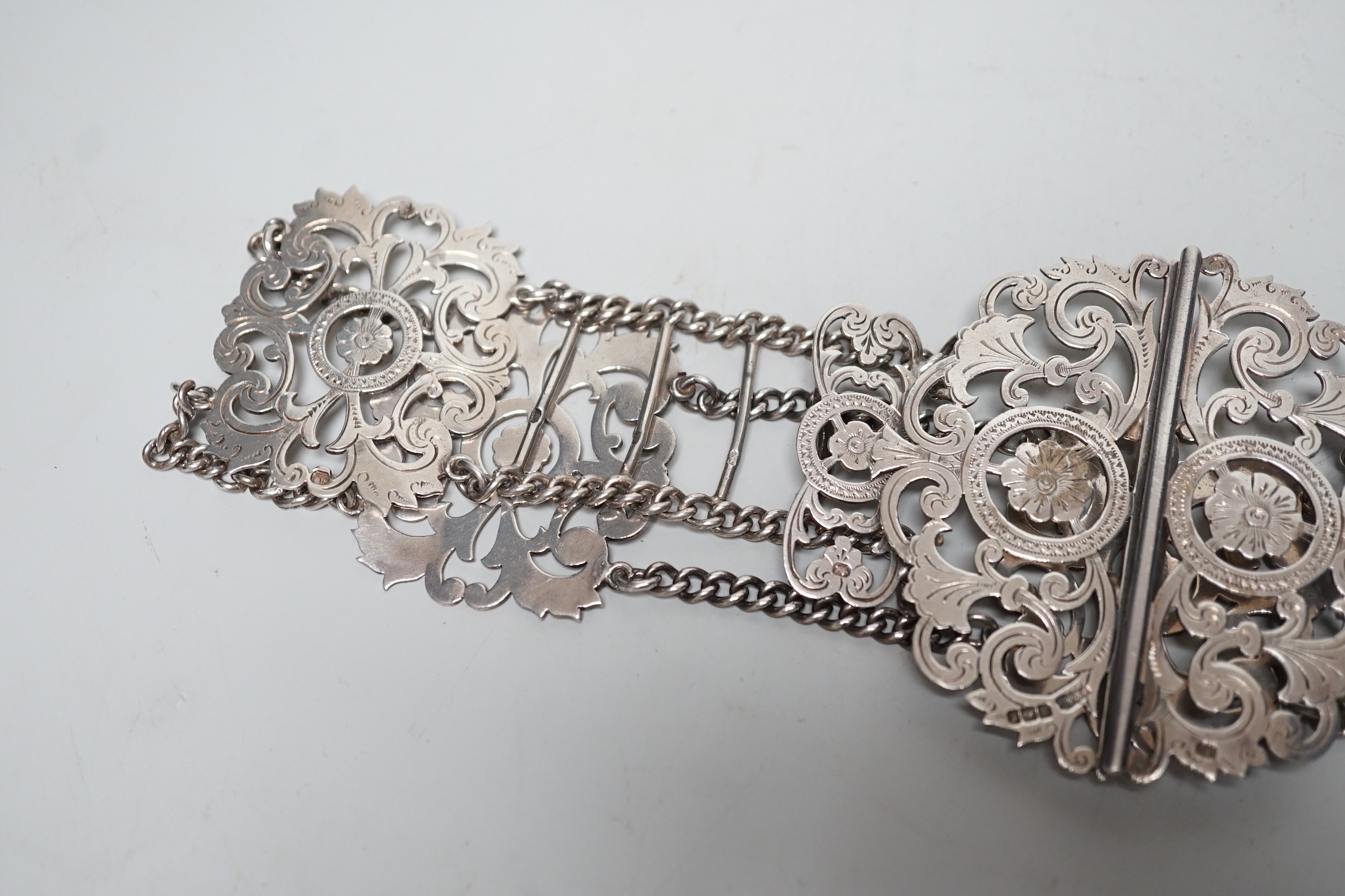 A late Victorian pierced silver belt, with chain links, James Dixon & Sons, Sheffield, 1898, overall 59.6cm.